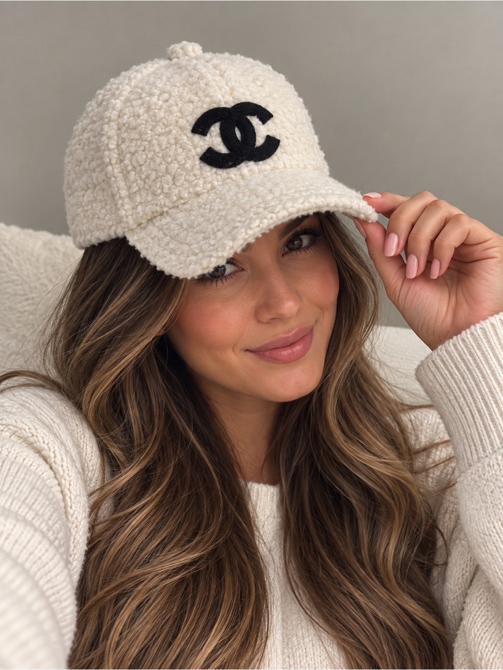 CHANEL Cream Teddy Baseball Cap with Black Logo Accent